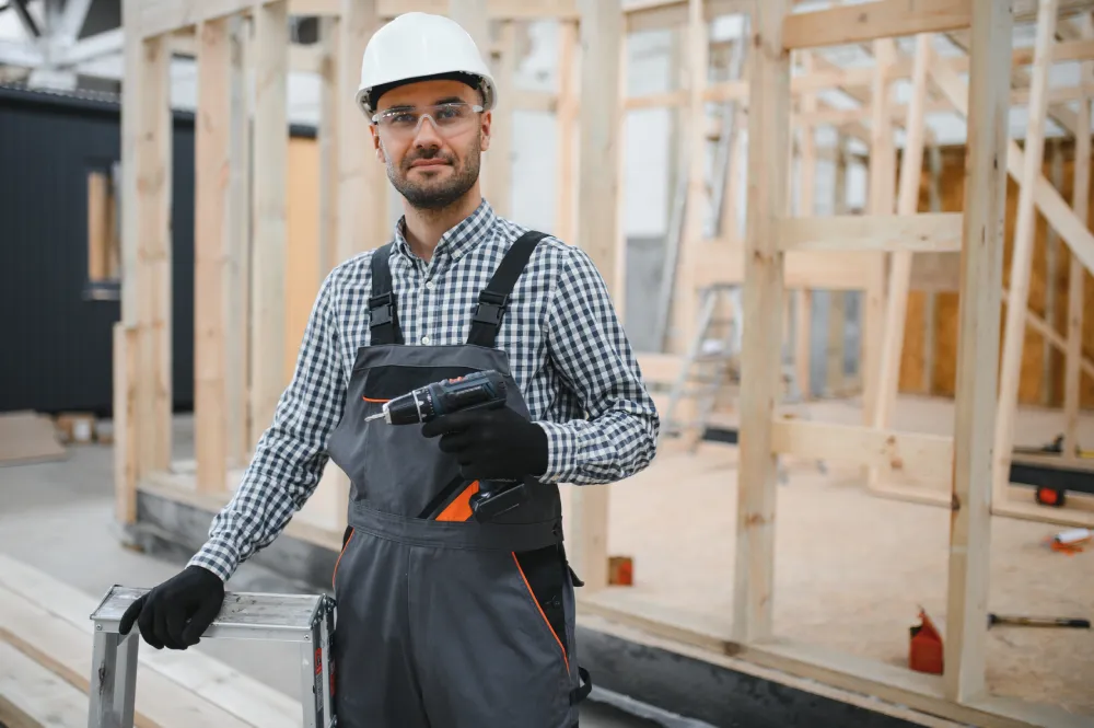 construction worker holding drill inside building 2026 03 24 07 41 21 utc (1)